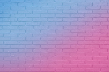 Fototapeta na wymiar 青からピンクのグラデーションのあるブロック塀