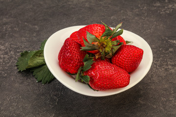 Ripe sweet strawberry with leaf