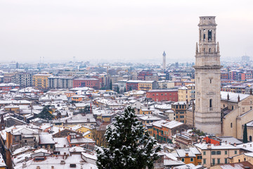 Aerial view of Verona downtown in winter with snow. Verona Cathedral and church of San Zeno. UNESCO...