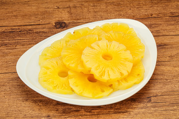 Marinated pineapple rings in the bowl