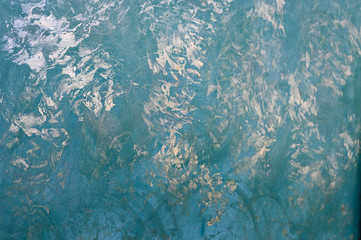 Fototapeta na wymiar Turquoise background with silver texture