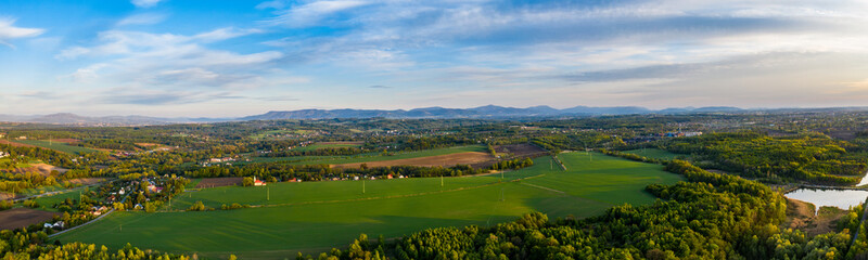 Obraz premium aerial view of panorama field and whole beskydy mountains, czech 10.5.2020