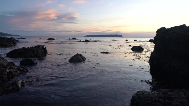 View of Mana Island in Plimmerton Wellington New Zealand at sunset