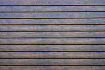 background of wooden dark lacquer strips