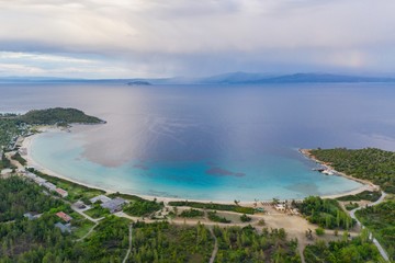 Aerial drone view of Paliouri Beach in Kassandra Sithonia penisula  Chalkidiki Greece
