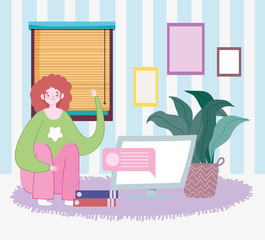 working remotely, young woman sitting on floor with laptop books