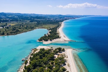 Fototapeta na wymiar Aerial drone view of Port Glarokavos and lagoon beach in Kassandra penisula Chalkidiki Greece