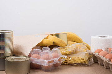 Set of food products. Coronavirus food delivery. Pasta, egg, canned food, bananas.