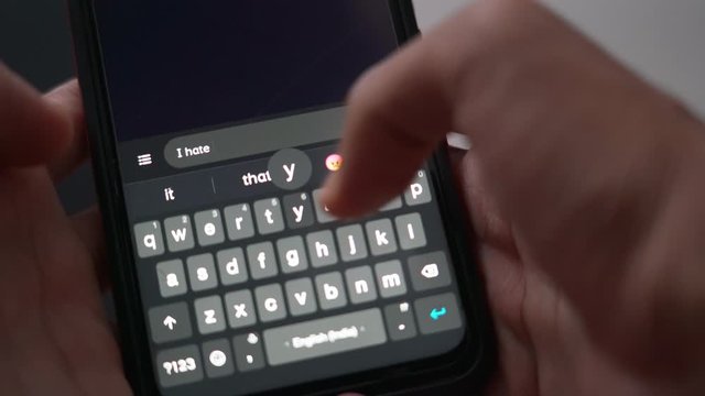 Man texting 'I hate you' to someone.