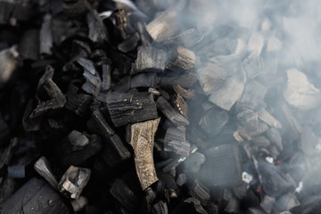 the coals texture smoldering and burning in the brazier with smok © gorbacheva777