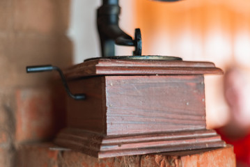 the phonograph and the old box are lying on the stove and