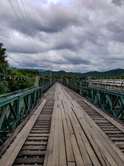 Fototapeta na wymiar Memorial bridge wwii outside nature village pai river cross wood metall lights chiang mai north thailand forest trees