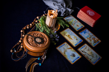 Mystical atmosphere, view of tarot card on the table, esoteric concept, fortune telling and predictions