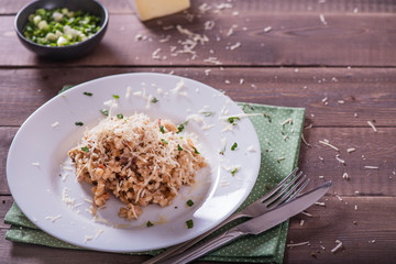 risotto with mushrooms, fresh herbs and parmesan cheese. Tasty and healthy vegetarian lunch