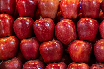 Close up red apples background.