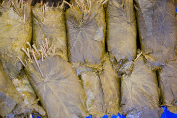 Pickled grape leaves close-up. Grape leaves for preparation of traditional oriental dishes and...
