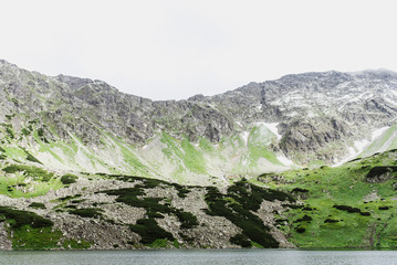 Beautiful view of the mountains and the lake in summer.
