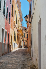 Obraz na płótnie Canvas Houses in a narrow alley
