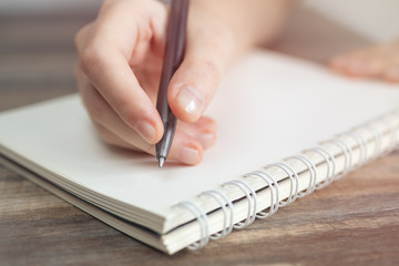 Vintage close up of woman hands holding smartphone, touching a mobile phone screen. Online communication concept