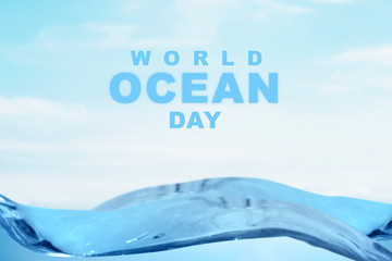 Sea waves with World Ocean Day text