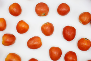 Naklejka na ściany i meble red tomatoes background. Group of tomatoes 