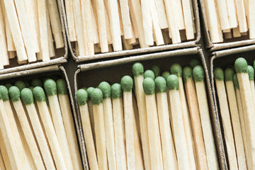 A box of matches in the background.