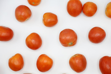 Fototapeta na wymiar red tomatoes background. Group of tomatoes 