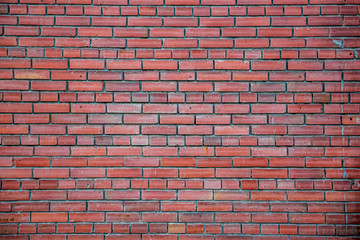 Fototapeta na wymiar brick red wall front view