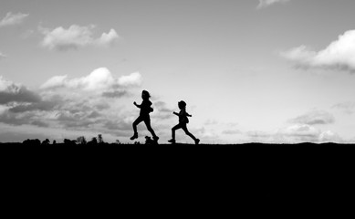 Fototapeta premium Children running silhouette
