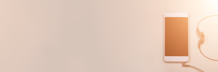 Podcast concept. Phone and earphones. Grey background. Music top view. Audio technology. Hipster lifestyle. Mockup black screen. Digital culture. School homework. Lockdown accessory