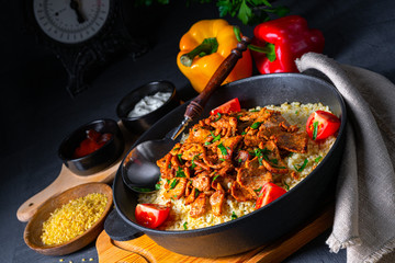 rustic bulgur pans with gratinated gyros and yoghurt