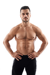 Shirtless muscular bodybuilder posing.