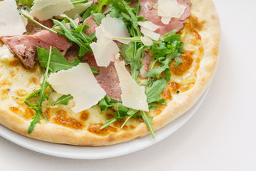 italian pizza with meat and cheese