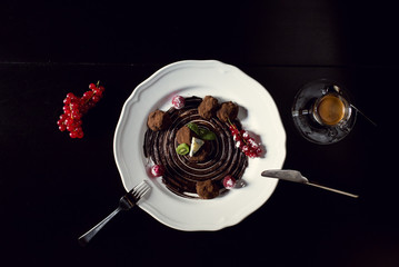 Chocolate truffle sweets with fruit and cheese in a restaurant.