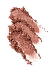Close-up of make-up swatches. Smears of crushed shiny brown eye shadow