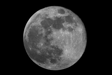 Closeup to the full phase super Moon, isolated in the black space, with no star and some creaters in detail.