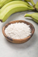 Fototapeta na wymiar Raw and dried green bananas, plantain flour, resistant flour, prebiotic food, gut health