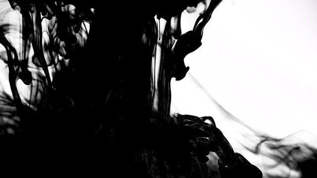 Black color ink drop in water. Slow Movement background liquid and smoke dynamic blend