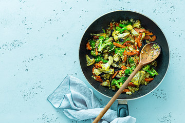 Colorful vegetarian food (dinner) - pan fried vegetables with bulgur