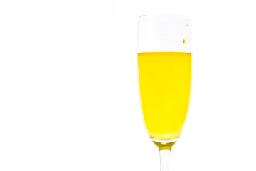 colored water in a glass on a white background. bright colors contrast