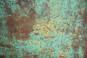 Rusty metal with peeling old paint