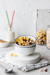 Assorted breakfast cereals: chocolate balls and honey stars