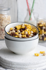 Assorted breakfast cereals: chocolate balls and honey stars