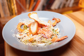 Caesar salad with shrimps