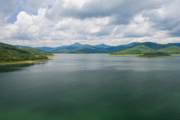 Beautiful scenery of dam with mountain and lake view at Thailand, Asia.