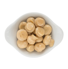 small mushrooms - appetizer of vegetables in olive oil. Homemade preserves as a side dish or aperitif