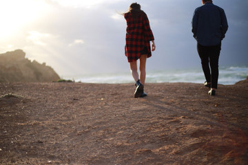 walking on the beach love casual style ocean two  couple of lovers sunset 