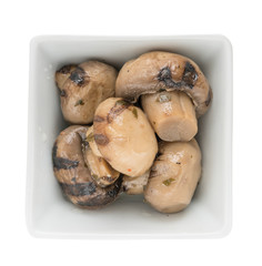 grilled mushrooms - appetizer of vegetables in olive oil. Homemade preserves as a side dish or aperitif
