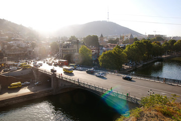 View of the Metekhi Bridge in Tbilisi at sunset