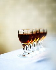 Glasses with cognac on a gray background
